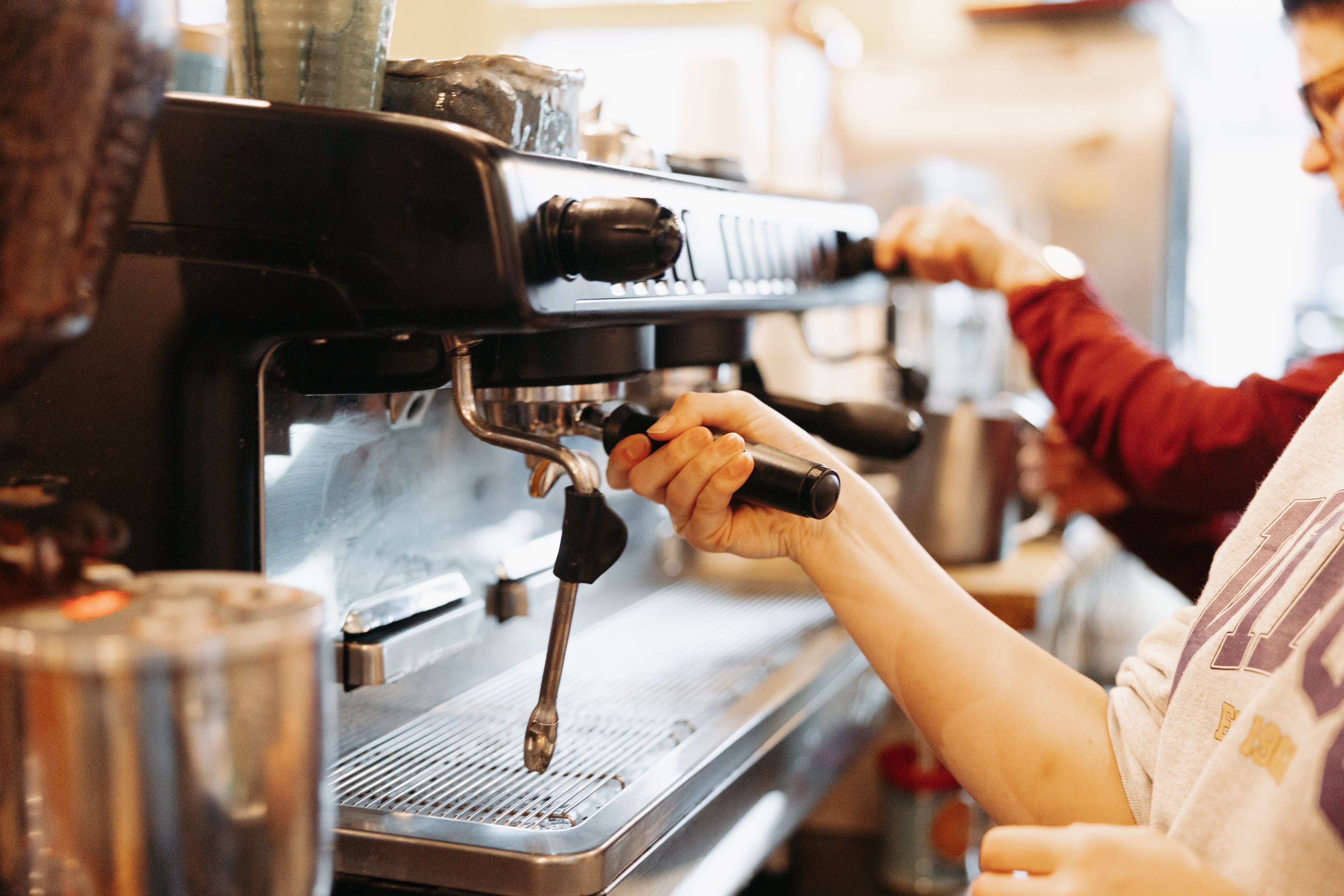 Baristas making coffee