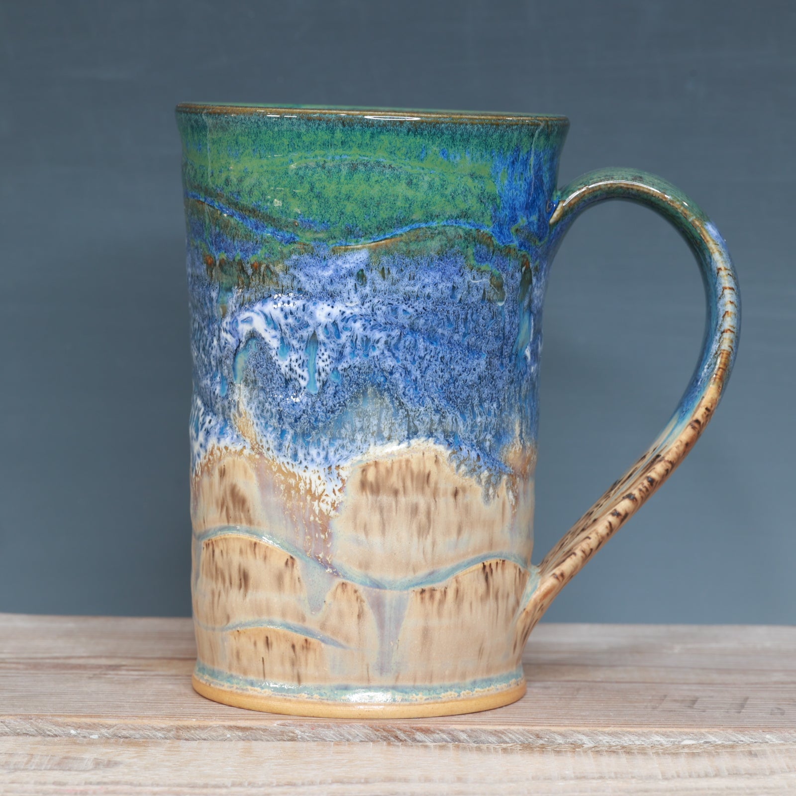 Blue surf and Sandstone Beach 21-22 oz