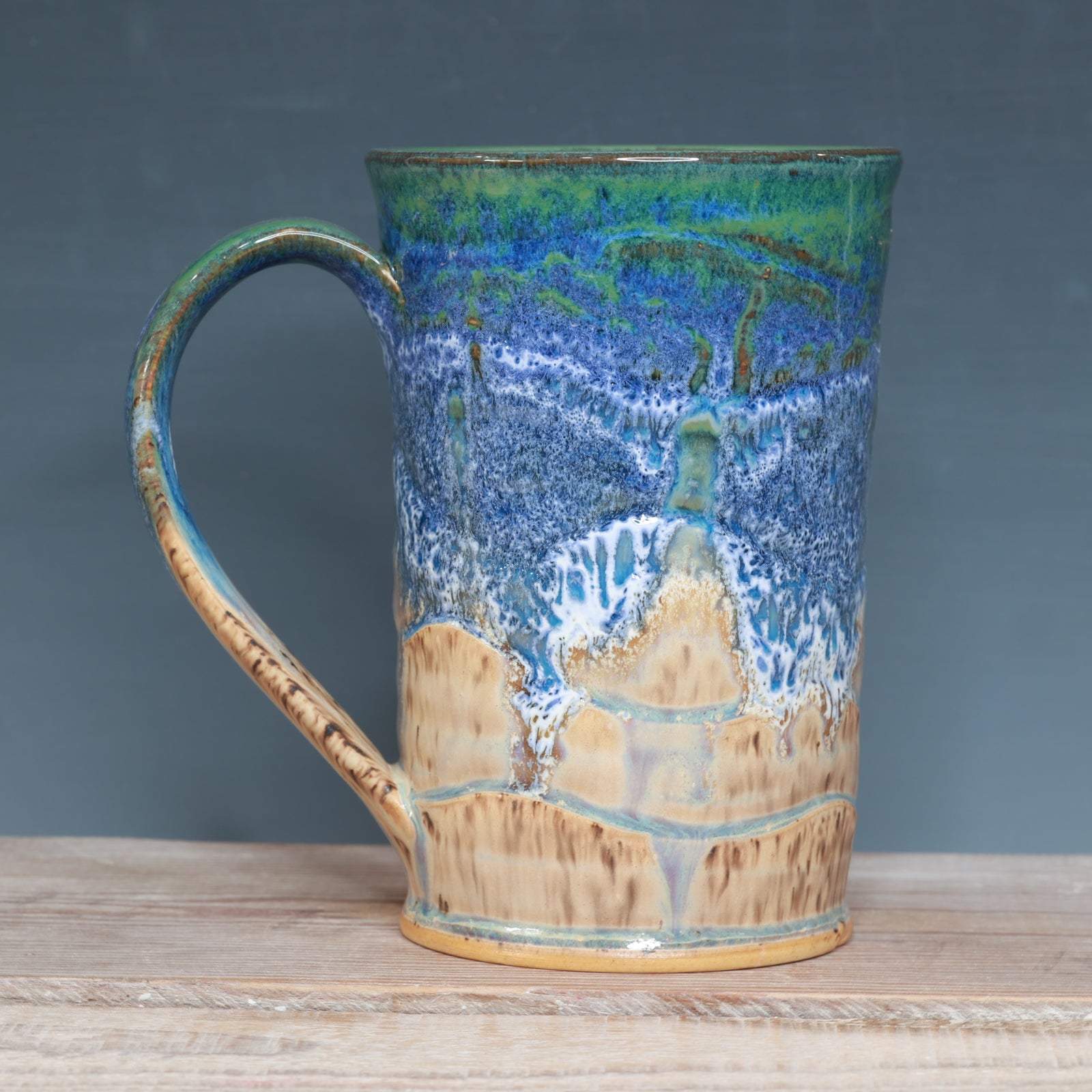 Blue surf and Sandstone Beach 21-22 oz