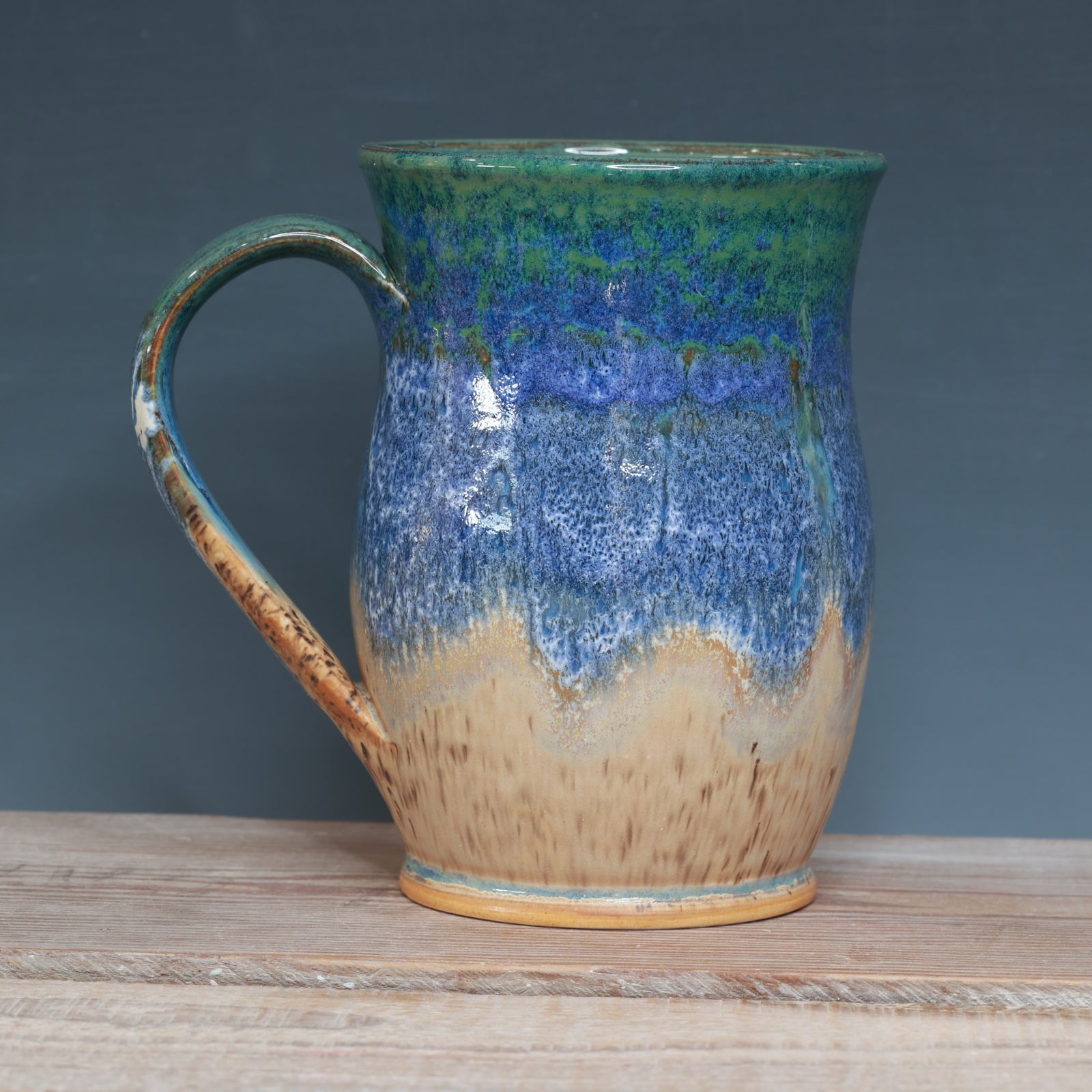 Blue surf and Sandstone Beach 20-21oz