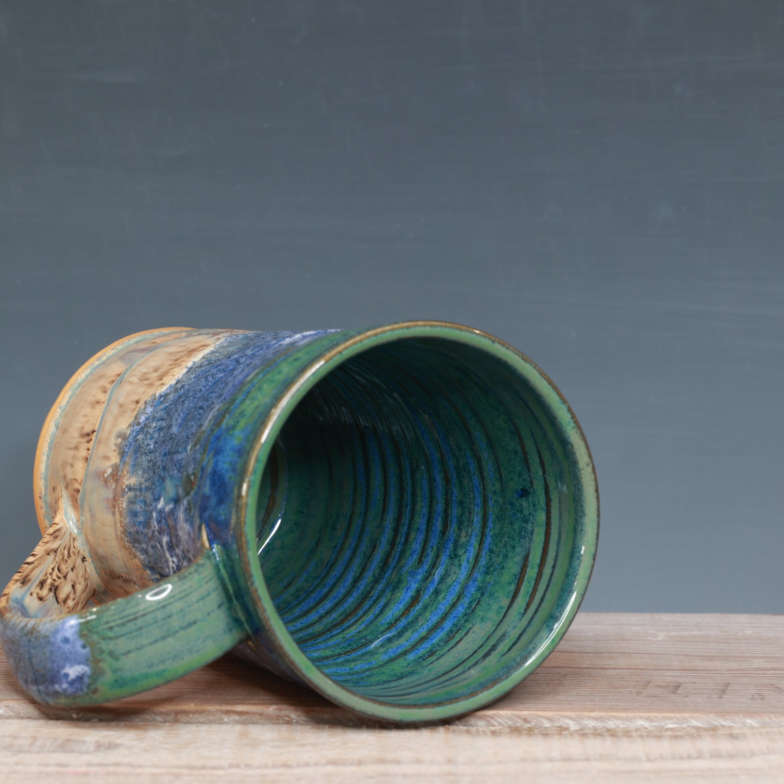 Blue surf and Sandstone Beach 21-22 oz