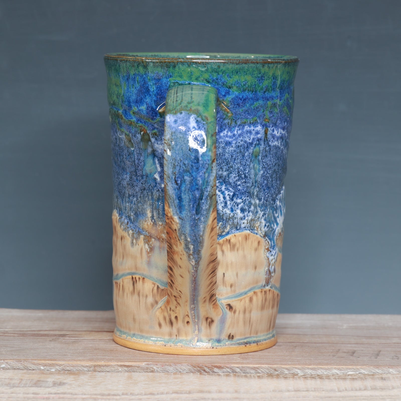 Blue surf and Sandstone Beach 21-22 oz