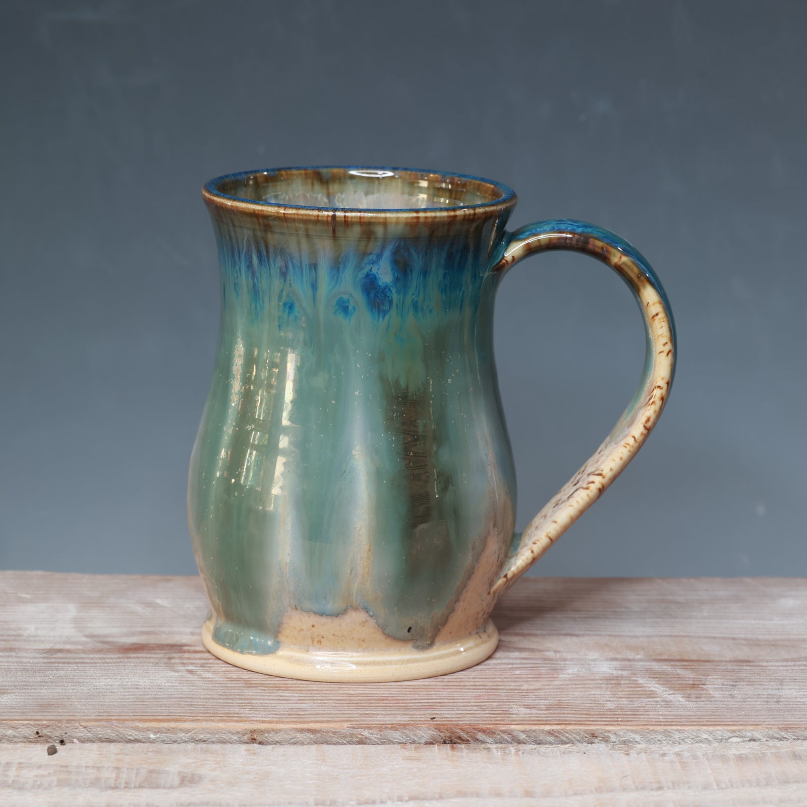 Midnight Rain over Winter Wood mug 17 oz.