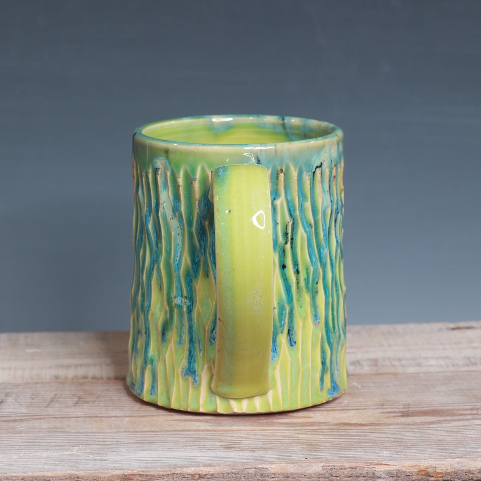 Carved Aurora Green and Green Opal mug 22-23 oz.