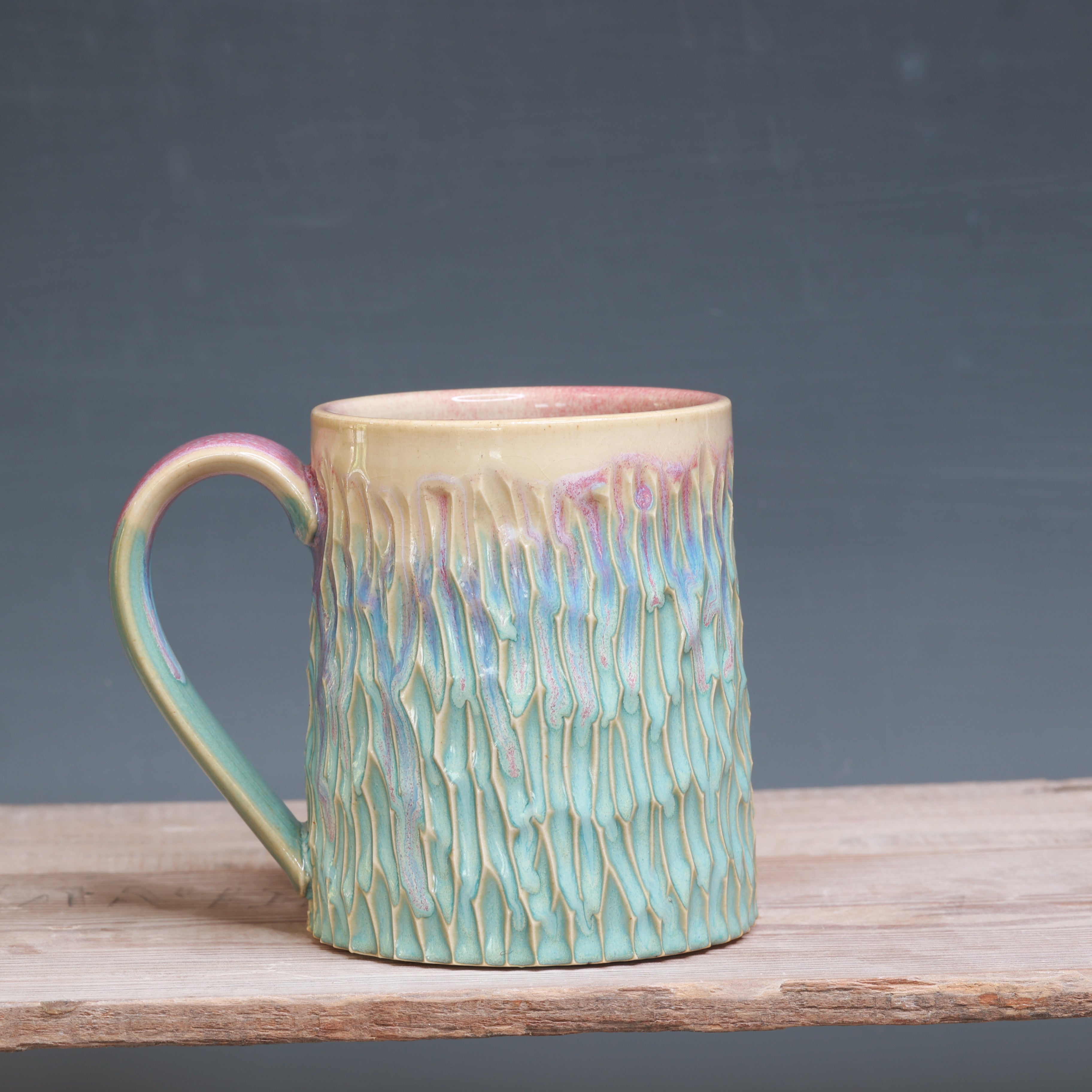Raspberry Mist over Norse Blue Carved mug 17-18 oz.