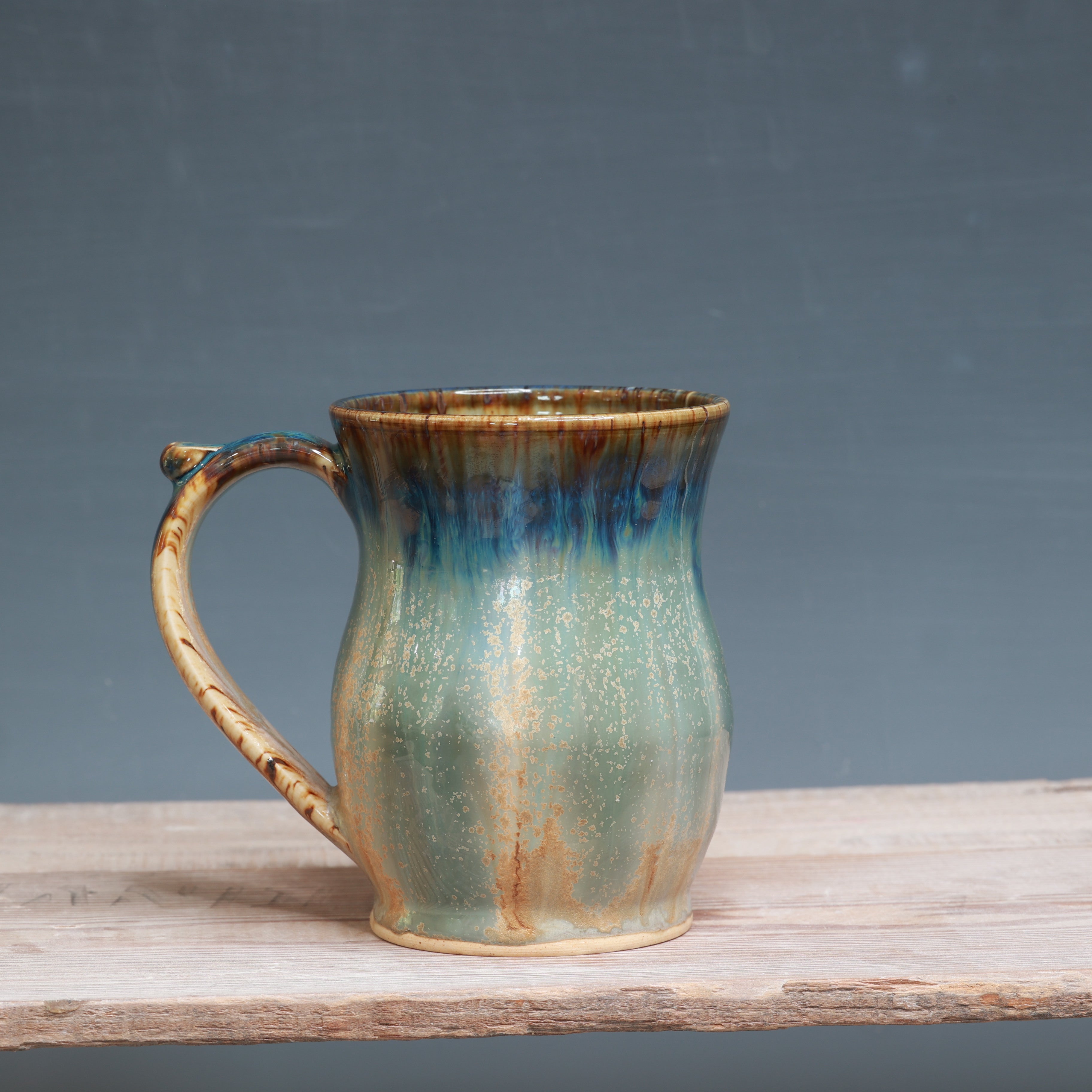 Midnight Rain over Winterwood mug 12-13 oz.