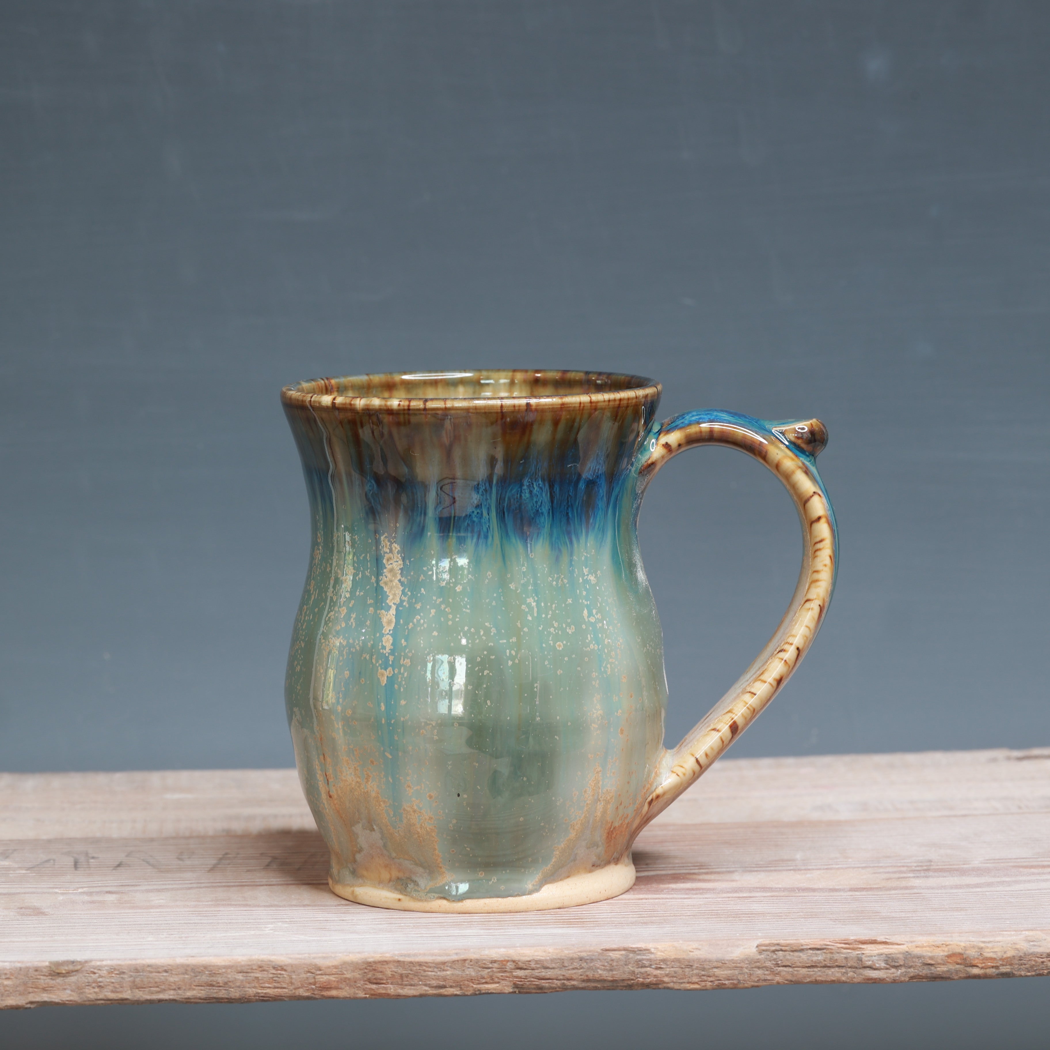 Midnight Rain over Winterwood mug 12-13 oz.