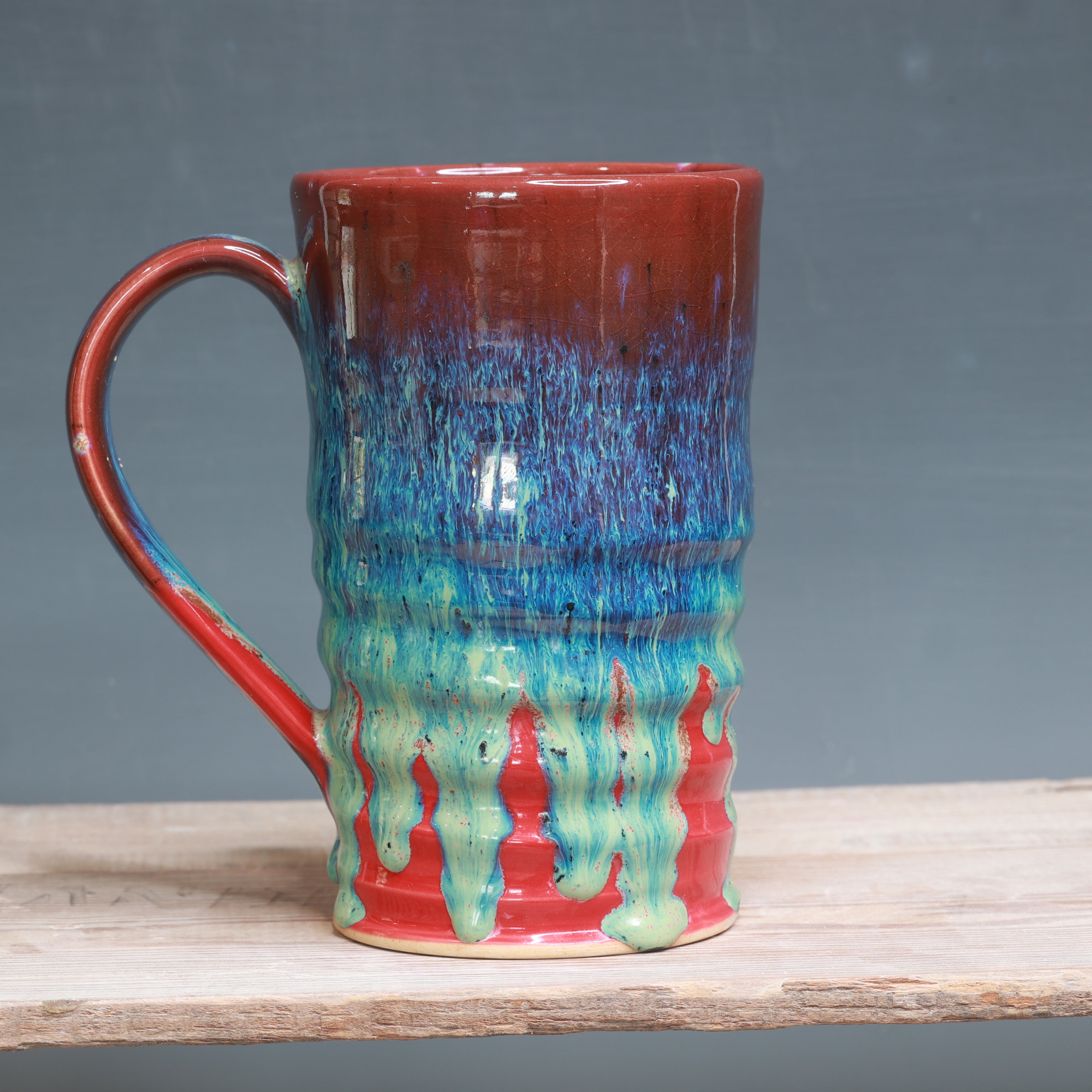 Aurora Green over Red mug 25-27 oz.