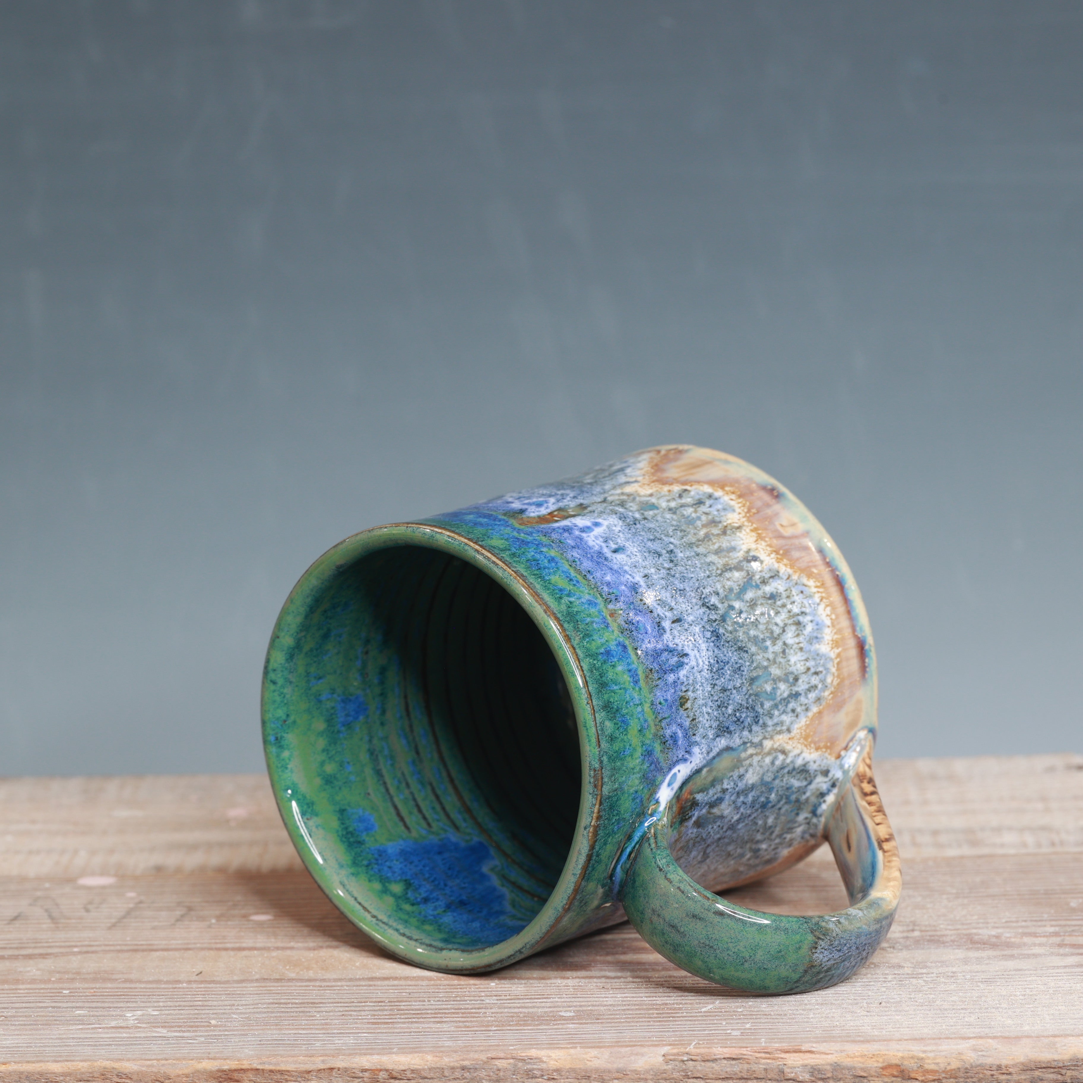 Blue surf and Sandstone Beach 17-18 oz.