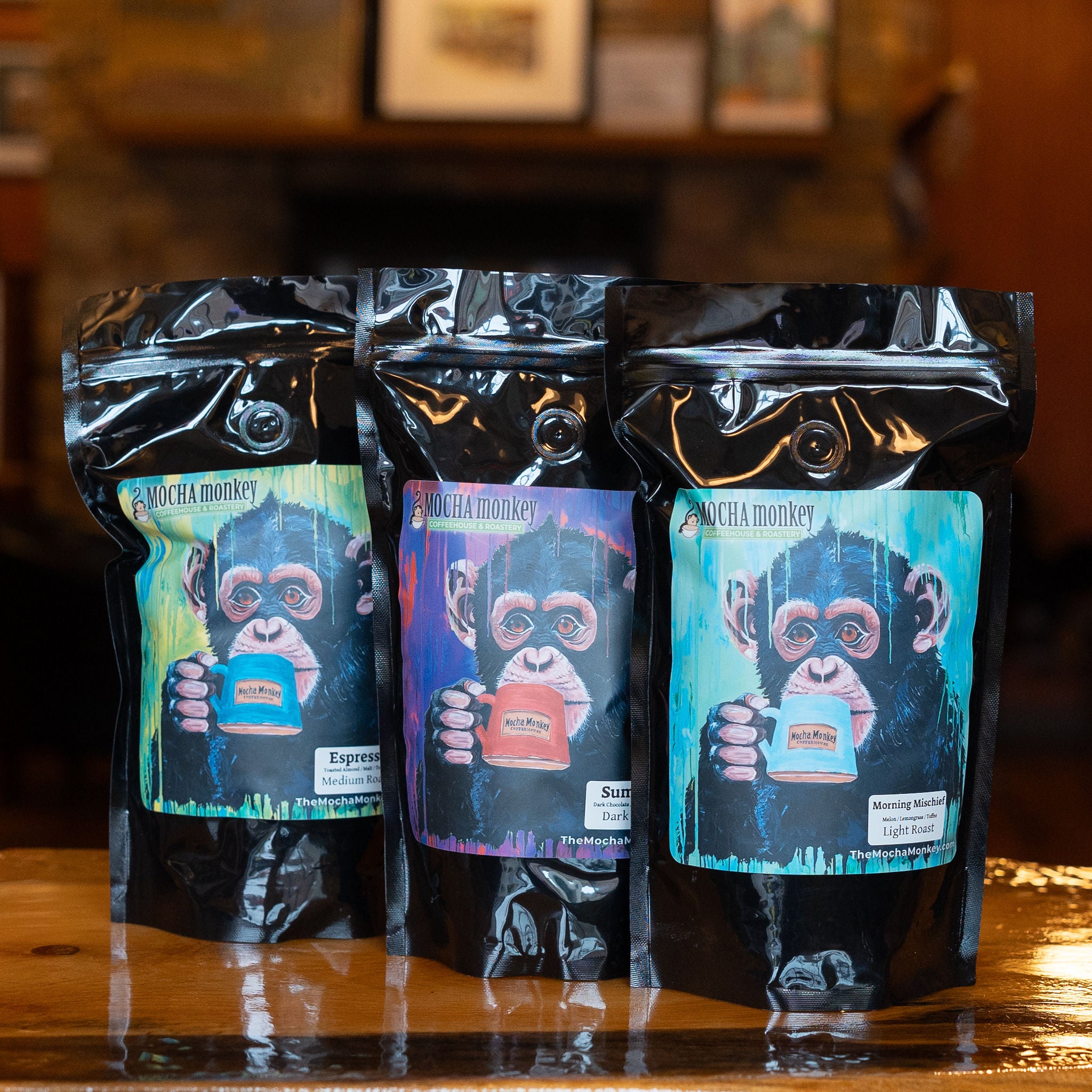 Close up of Espresso, Sumatra and Morning Mischief Coffee bags on a table
