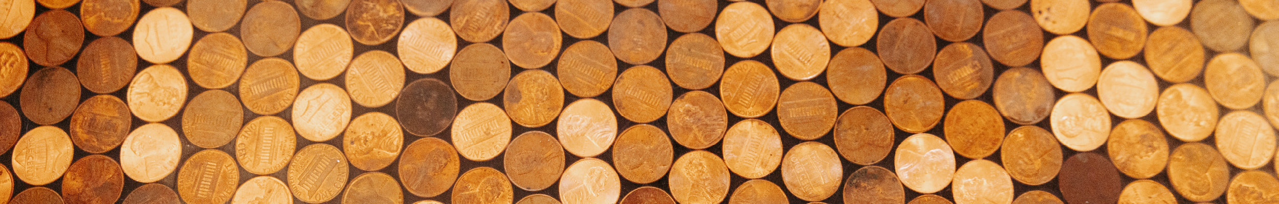 A tabletop decorated with pennies