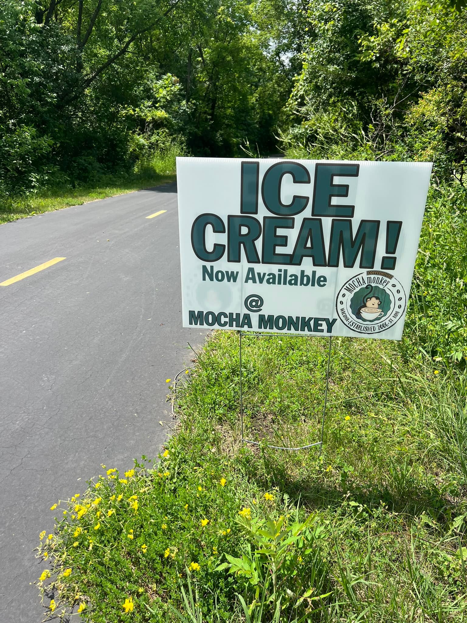 Road sign that says Ice Cream! Now available at Mocha Monkey