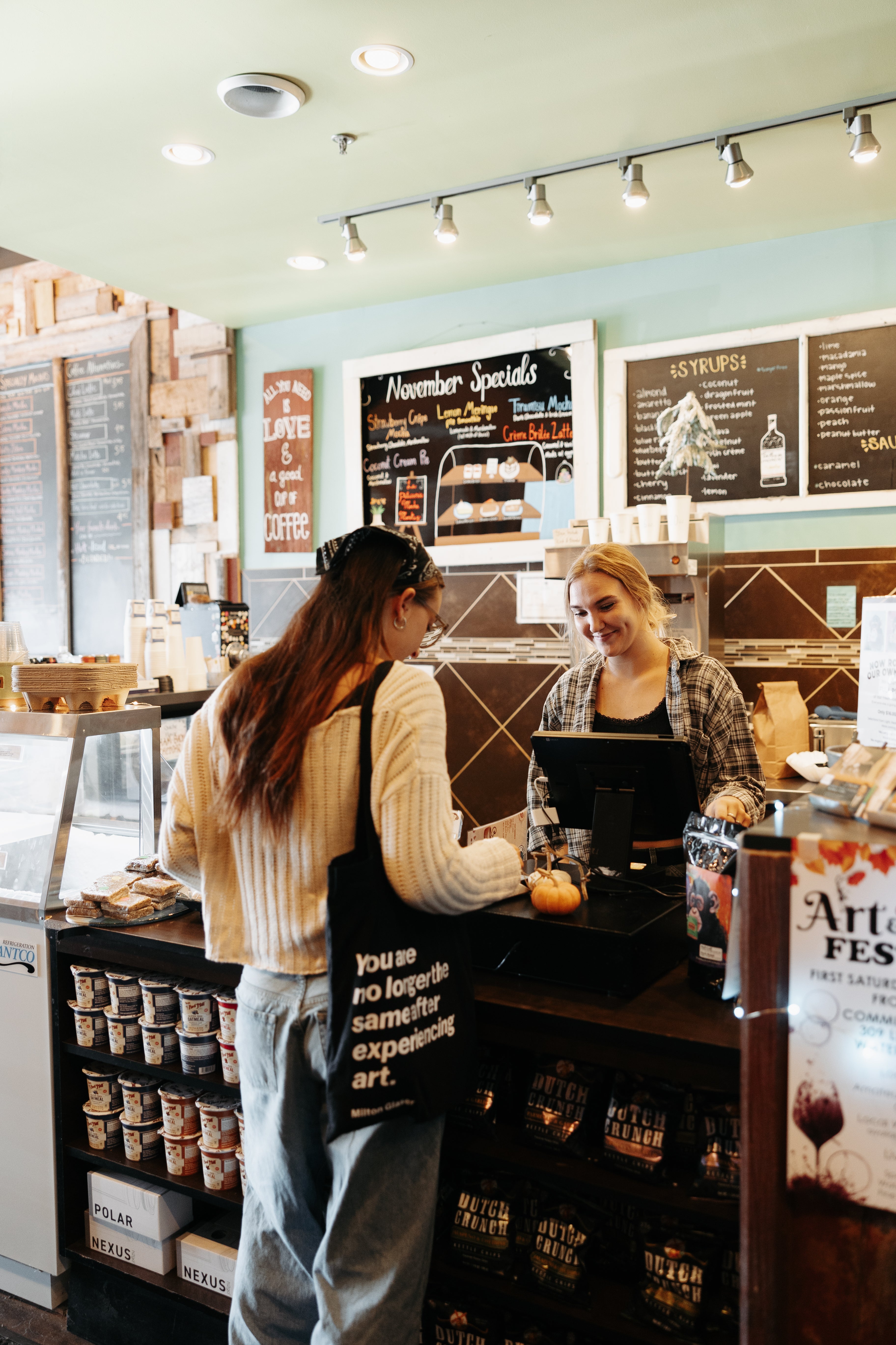 Barista and customer at Mocha Monkey Coffeehouse in St. Boni