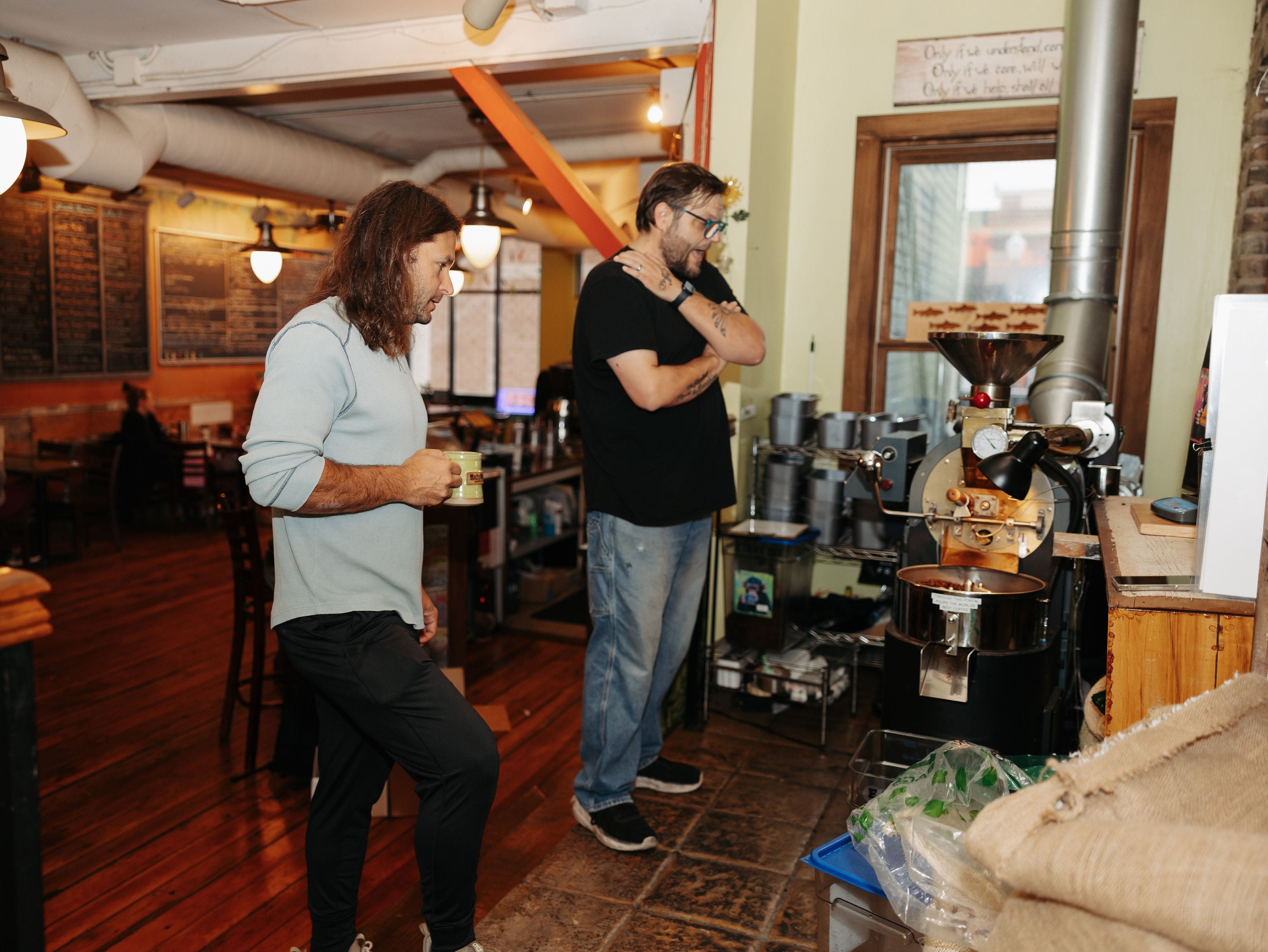 Jon and John regard "Marcel the coffee roaster" in the Mocha Monkey Downtown Waconia Coffeehouse