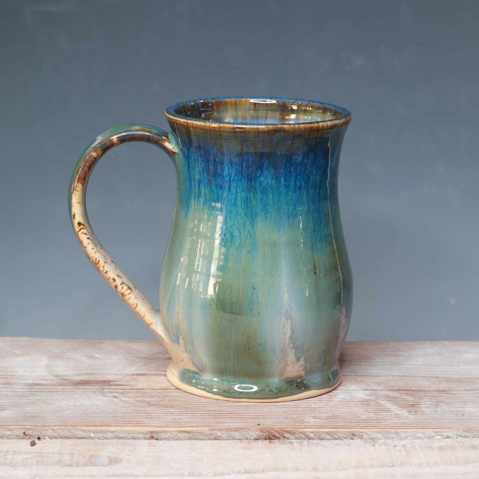 Midnight Rain over Winter Wood mug 17 oz.