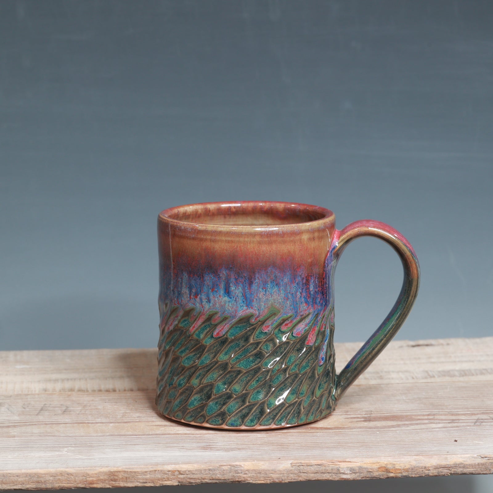 Carved Raspberry Mist and Blue Surf mug 13-14 oz.