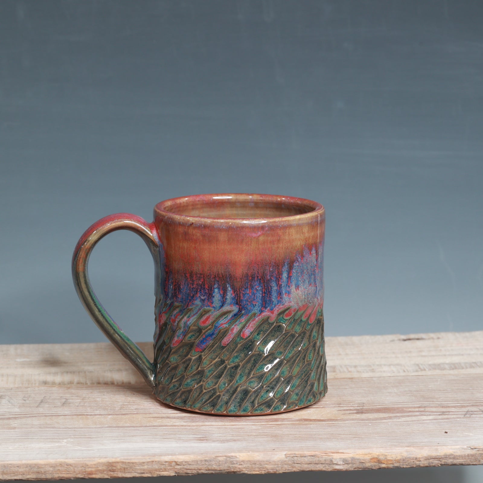 Carved Raspberry Mist and Blue Surf mug 13-14 oz.