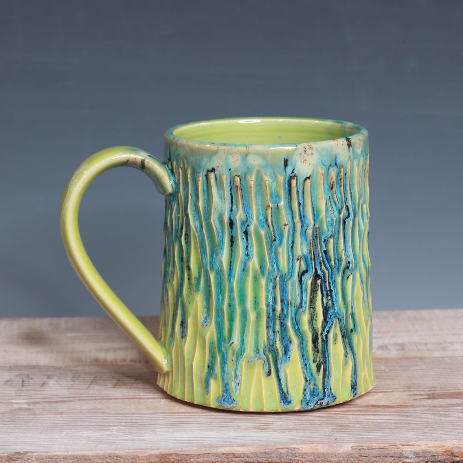 Carved Aurora Green and Green Opal mug 22-23 oz.
