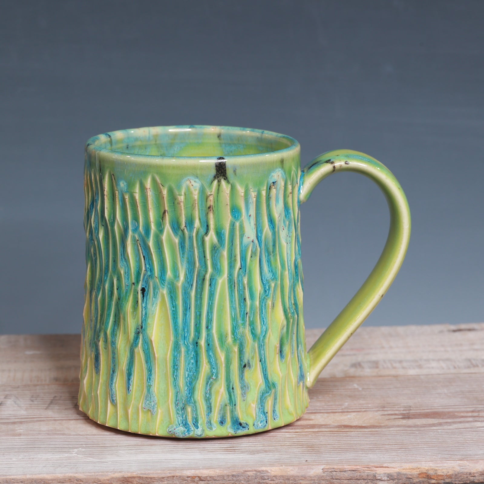 Carved Aurora Green and Green Opal mug 22-23 oz.