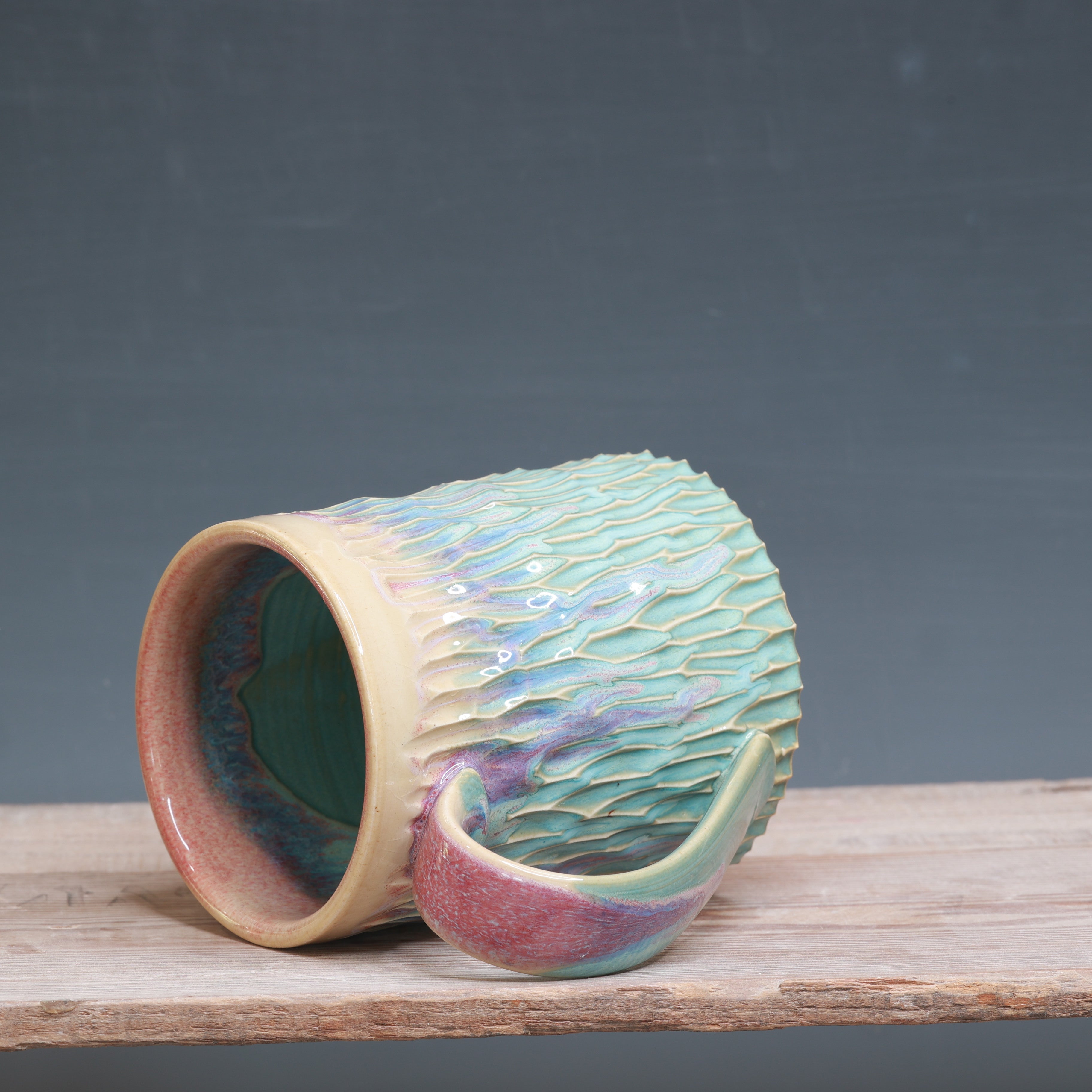 Raspberry Mist over Norse Blue Carved mug 17-18 oz.