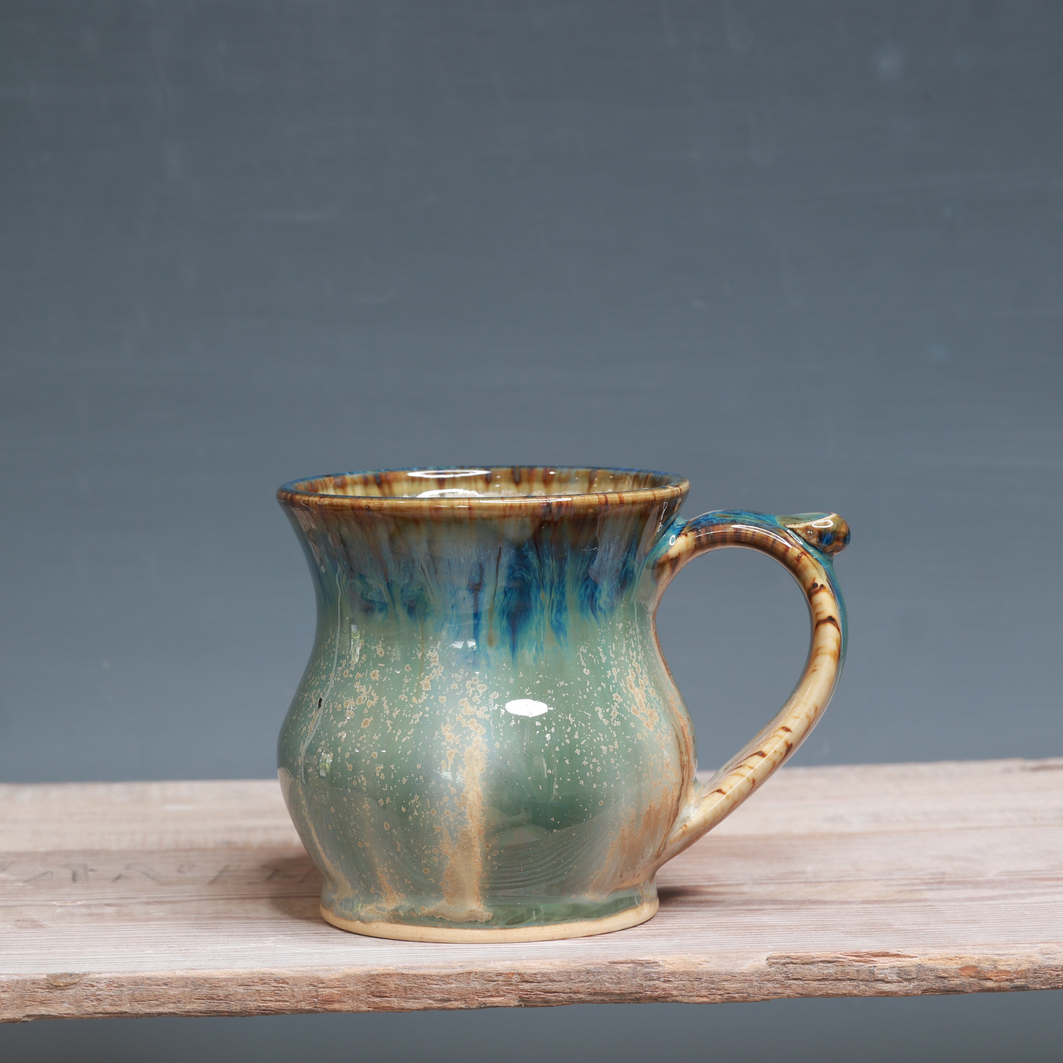 Midnight Rain over Winterwood mug 11-12 oz.