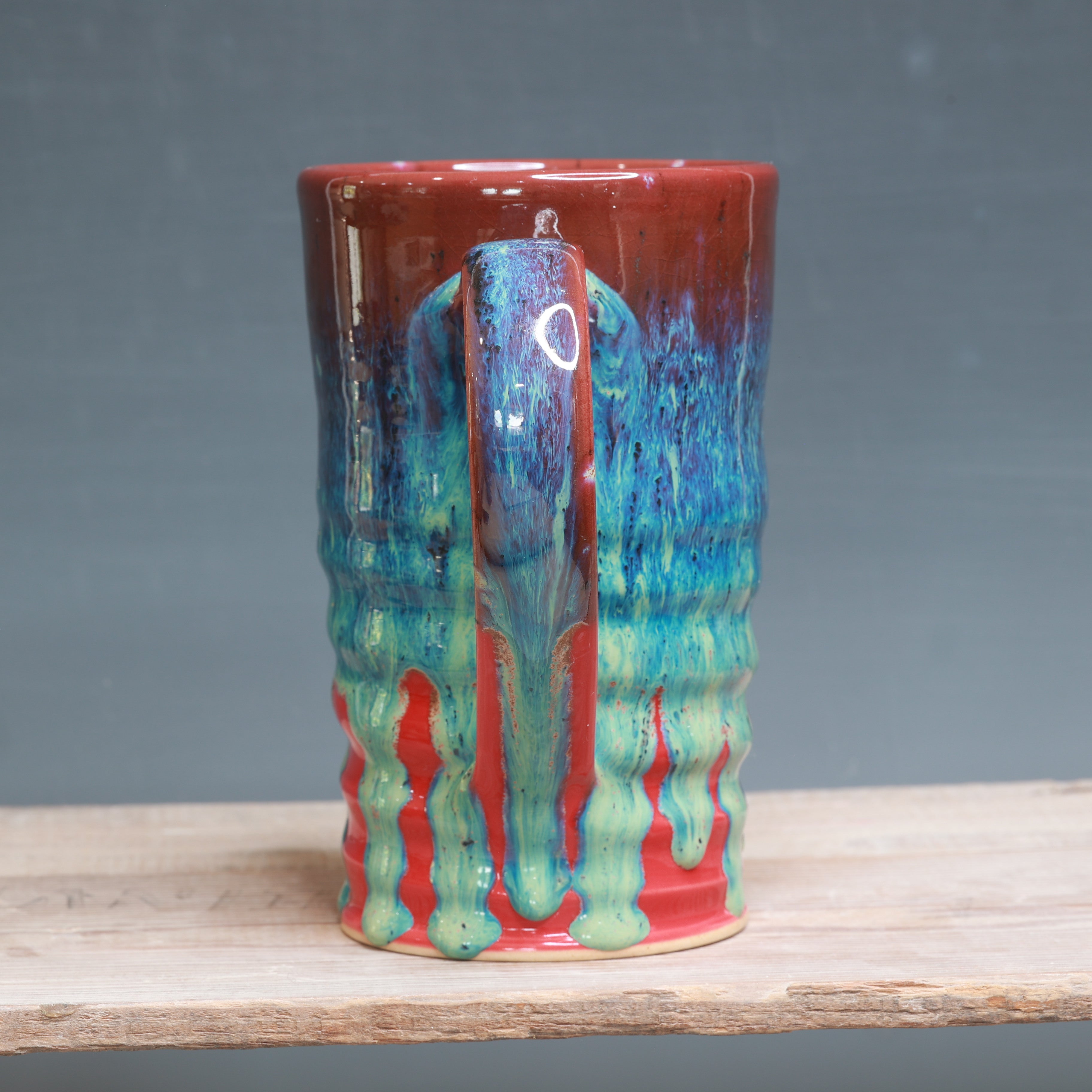 Aurora Green over Red mug 25-27 oz.