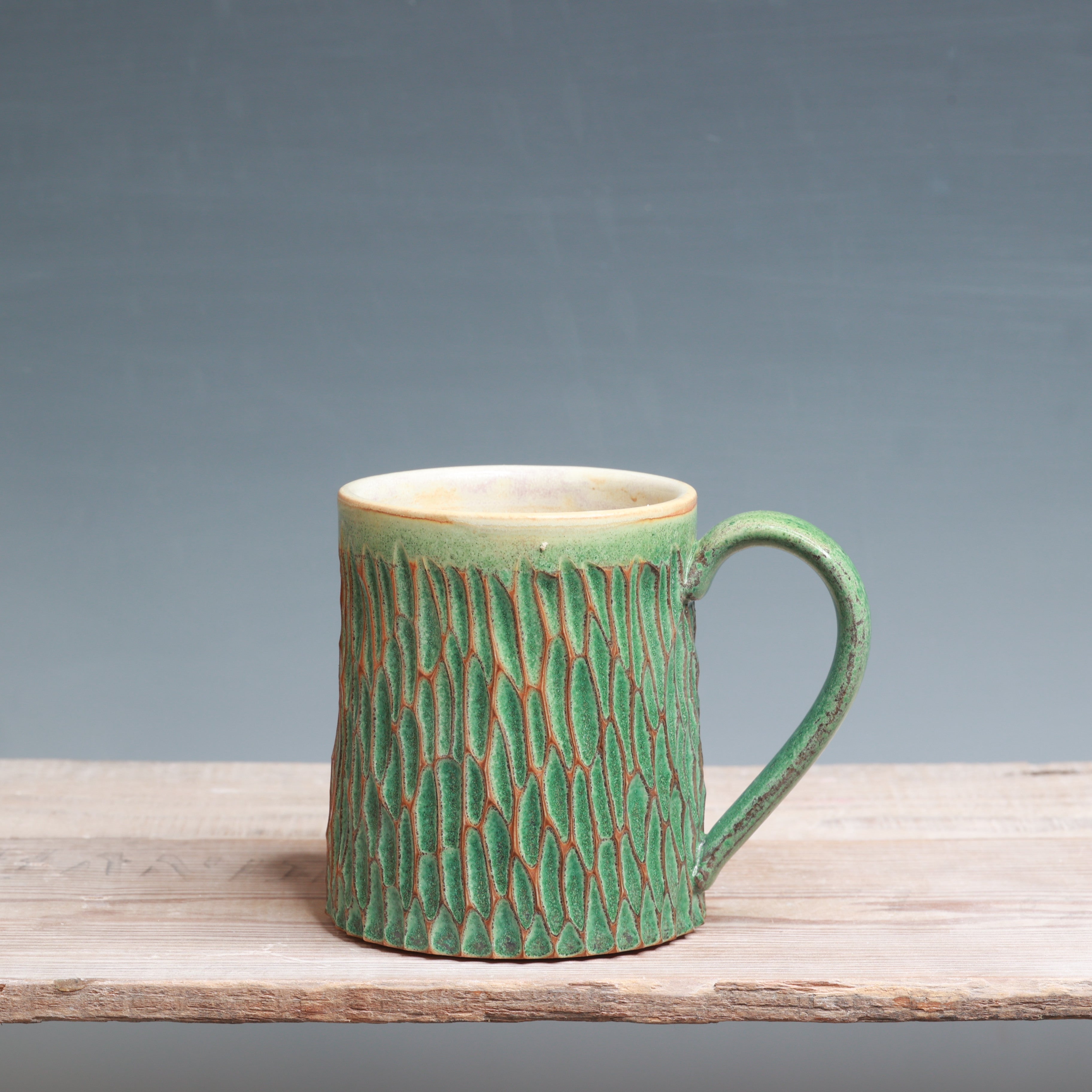 Satin Patina Carved mug 13-14 oz.