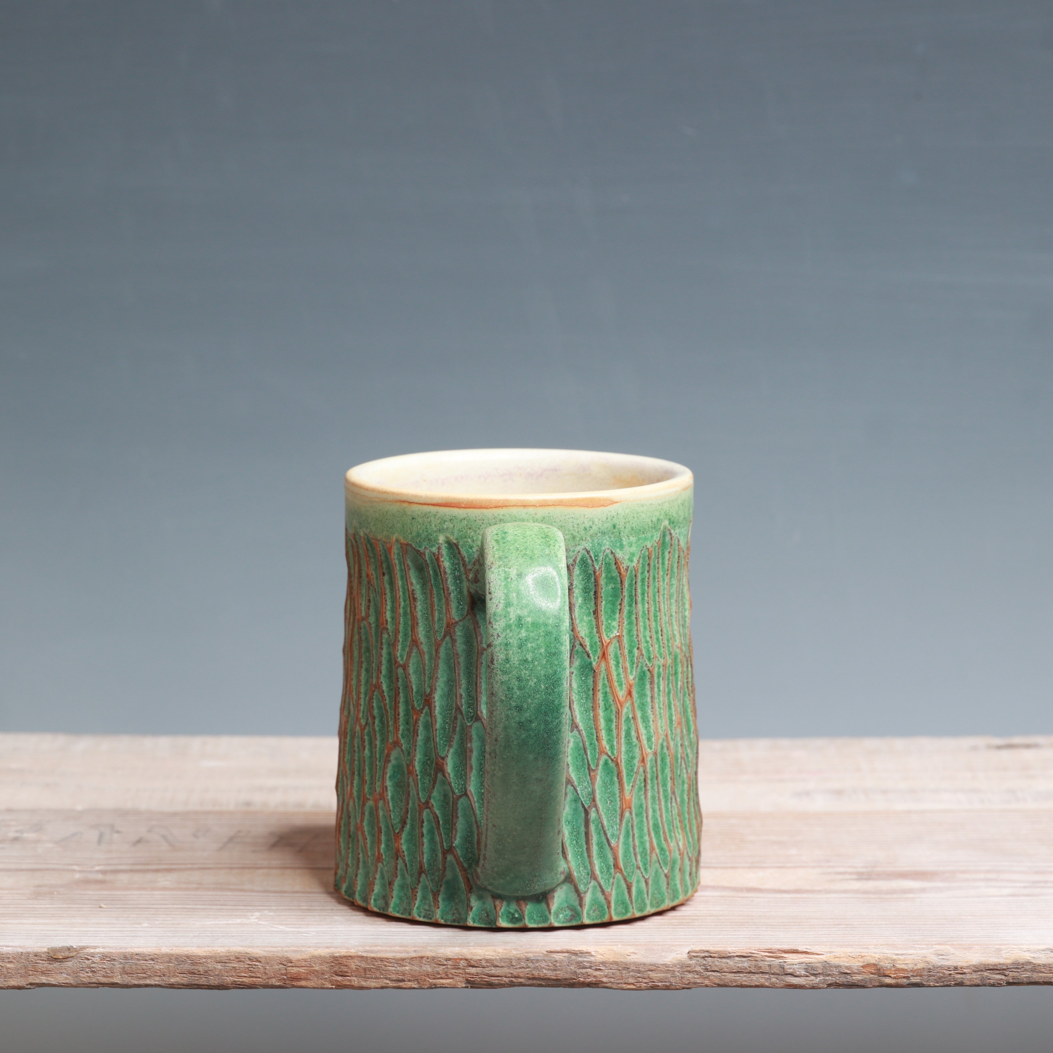 Satin Patina Carved mug 13-14 oz.