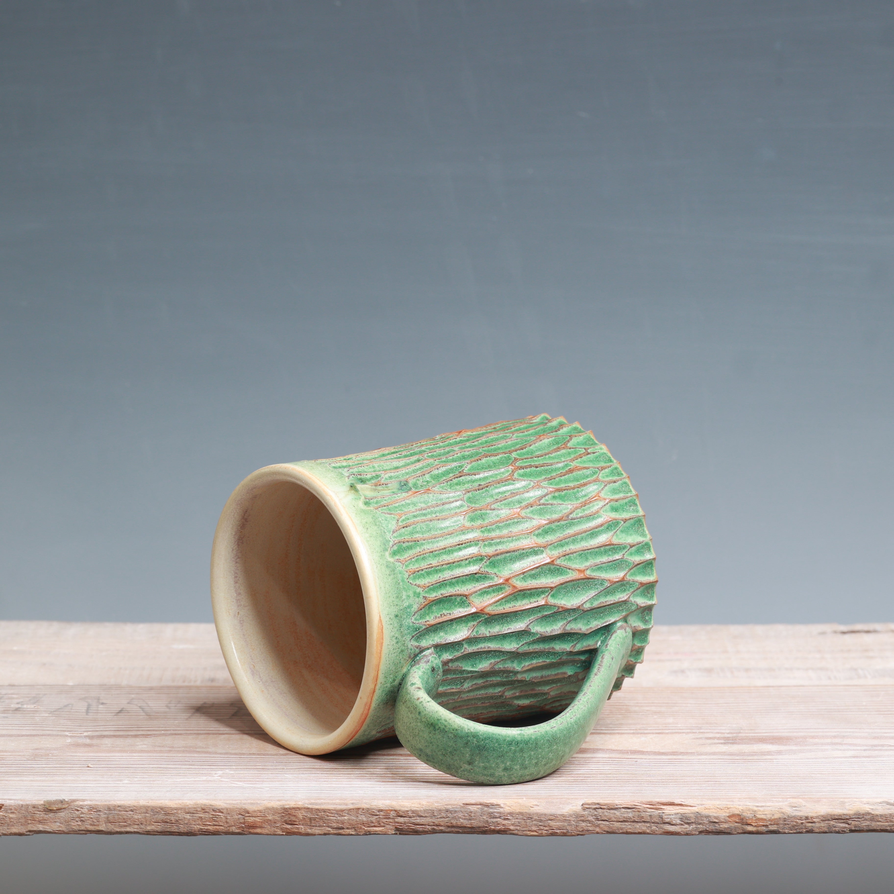 Satin Patina Carved mug 13-14 oz.