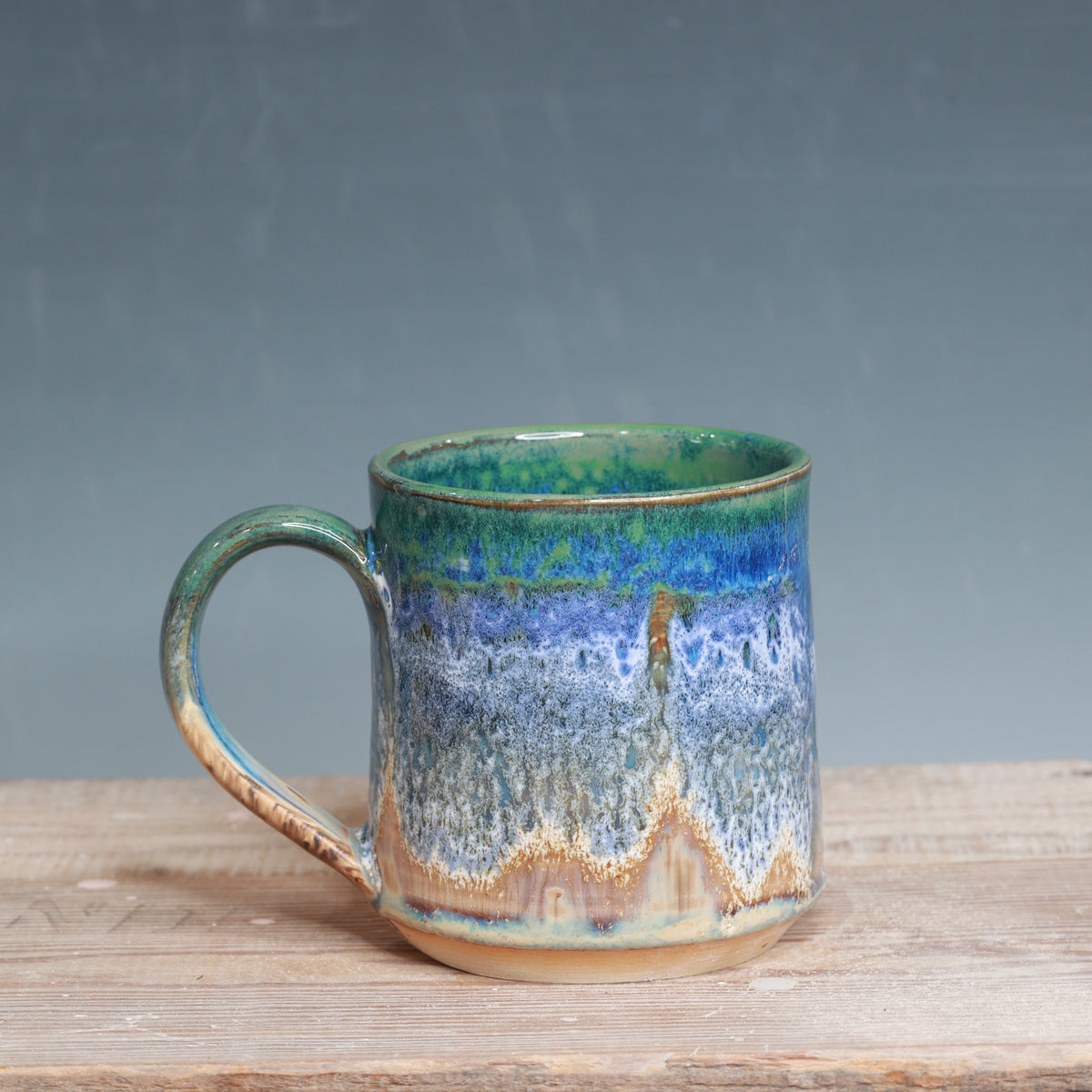Blue surf and Sandstone Beach 17-18 oz.