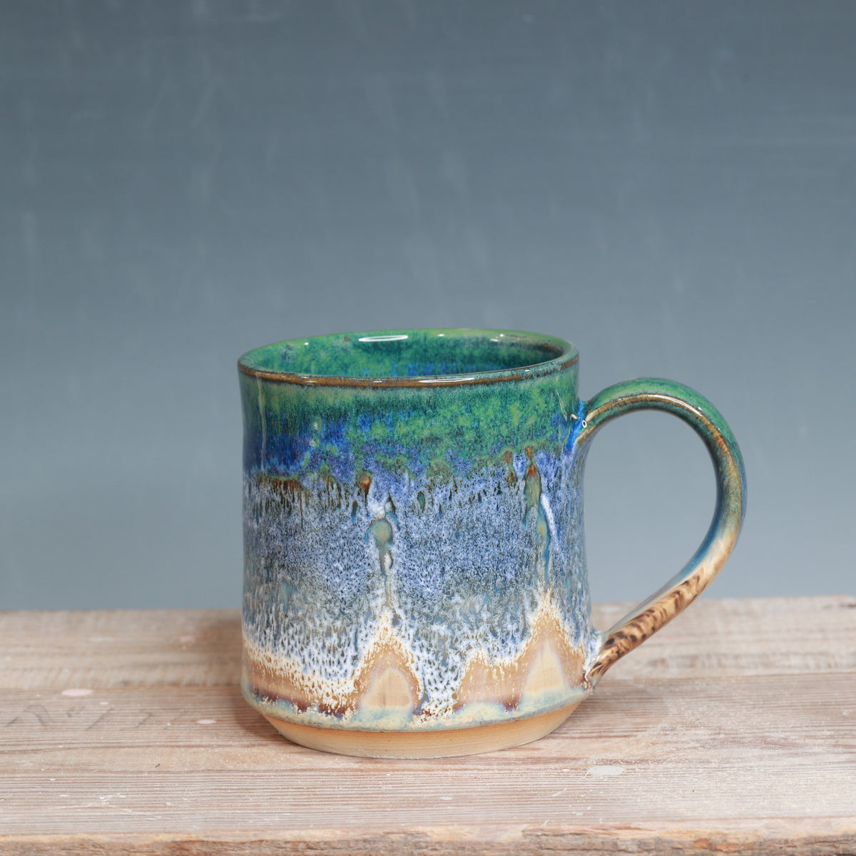 Blue surf and Sandstone Beach 17-18 oz.