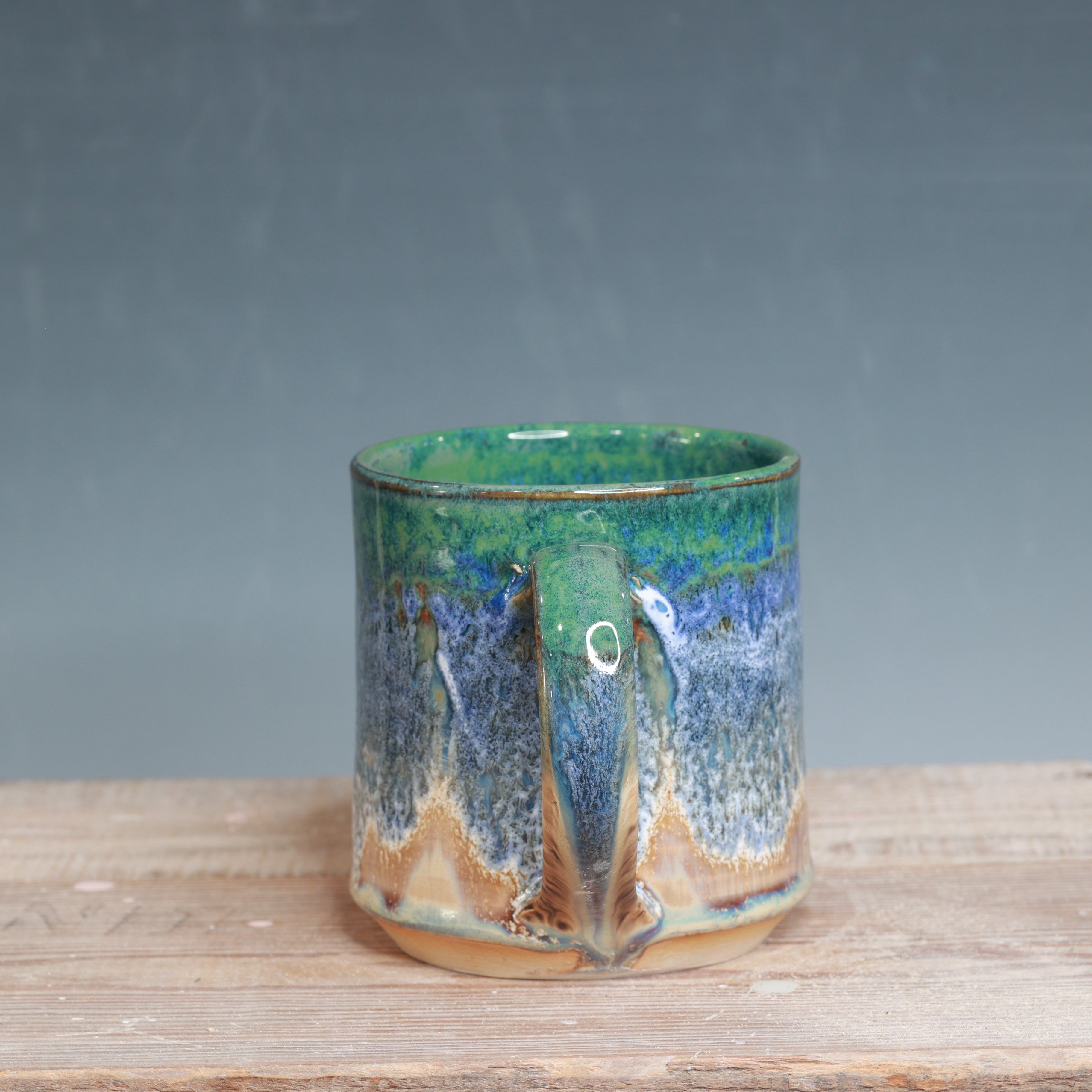 Blue surf and Sandstone Beach 17-18 oz.