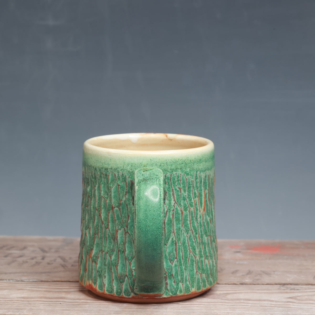 Satin Patina Carved Mug 14-15 oz.